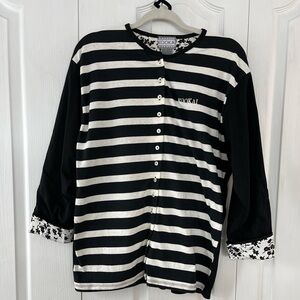 Vintage Kookai black & white striped top with floral lined sleeves.